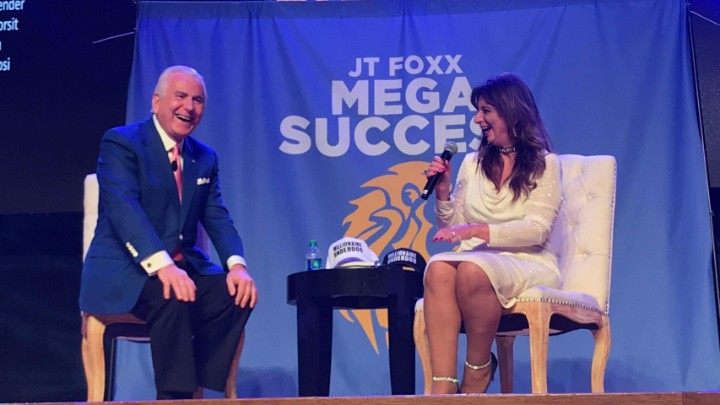 Dr. Dalal Akoury on stage at JT Foxx's Mega Success event