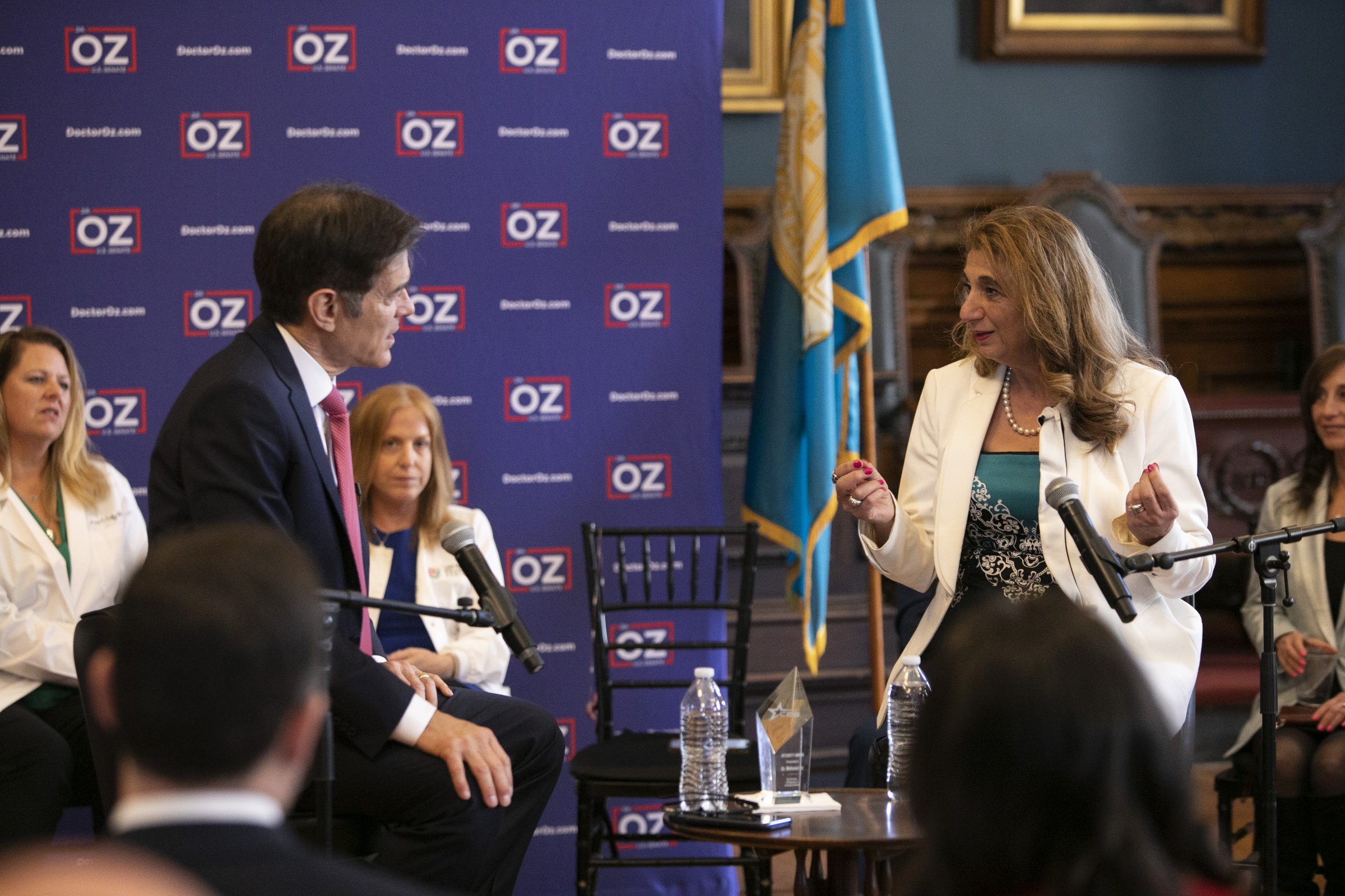 Dr. Dalal Akoury in conversation with Dr. Oz at a panel event, discussing integrative medicine